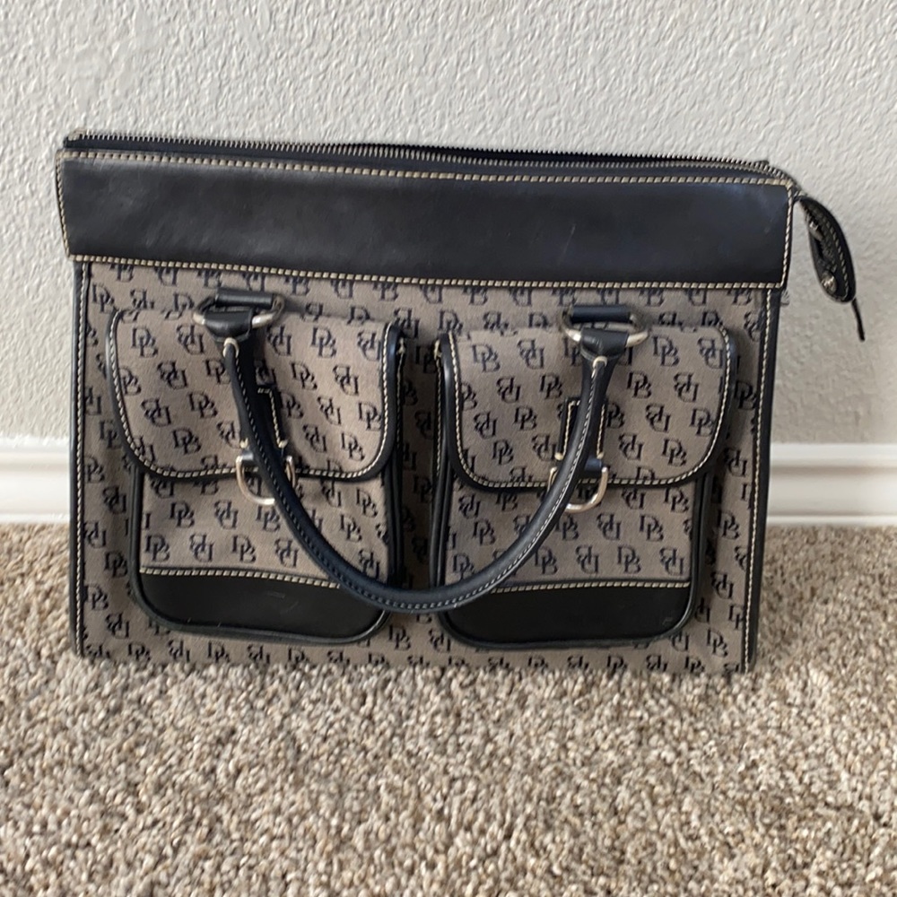 like new authentic Donney & Burke. mini zipper bag